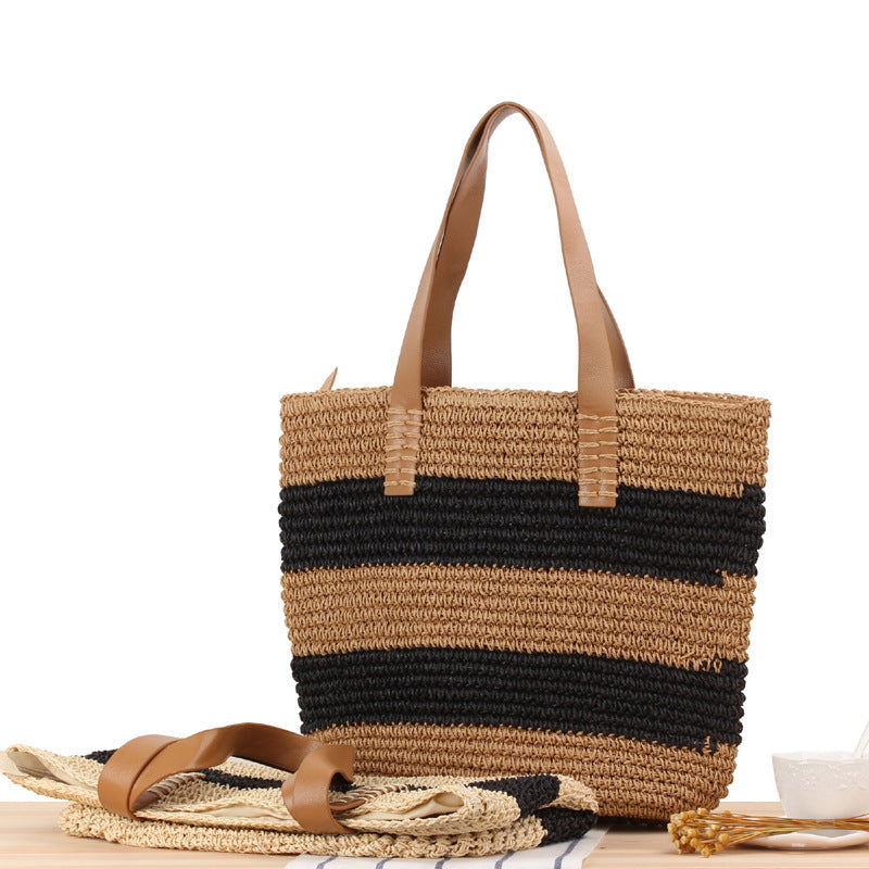 Spacious straw bag with elegant leather handles Bowlift