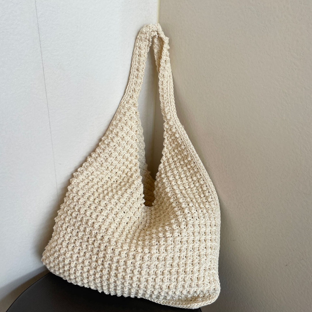 Hand-knotted everyday bag with structured surface Bowlift