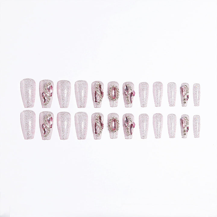 Glamorous artificial nails with sparkling rhinestone decorations Bowlift
