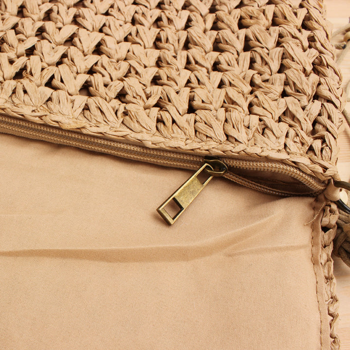 Braided Natural Material Handbag with Playful Fringes Bowlift