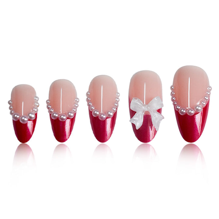 Decorative Stiletto Press-On Nails with Pearls and Bow Accents Bowlift