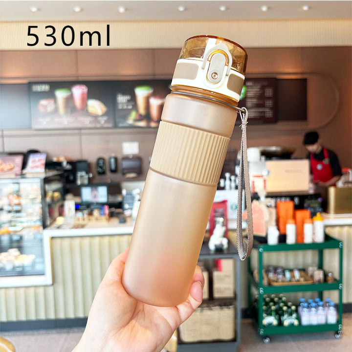 Ladies practical and leak-proof drinking bottle with integrated carrying strap Bowlift