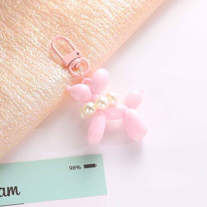 Playful keychain with balloon dog and beads Bowlift
