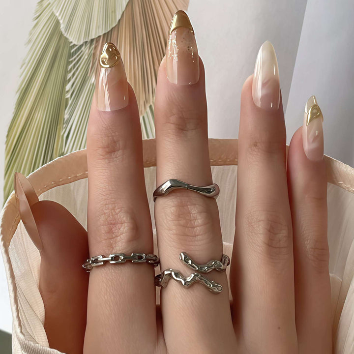 Artistic Press-On Nail Set with Gold and Floral Accents Bowlift