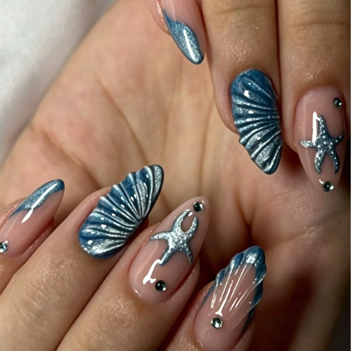 Artificial nail set with maritime shell and star motif Bowlift