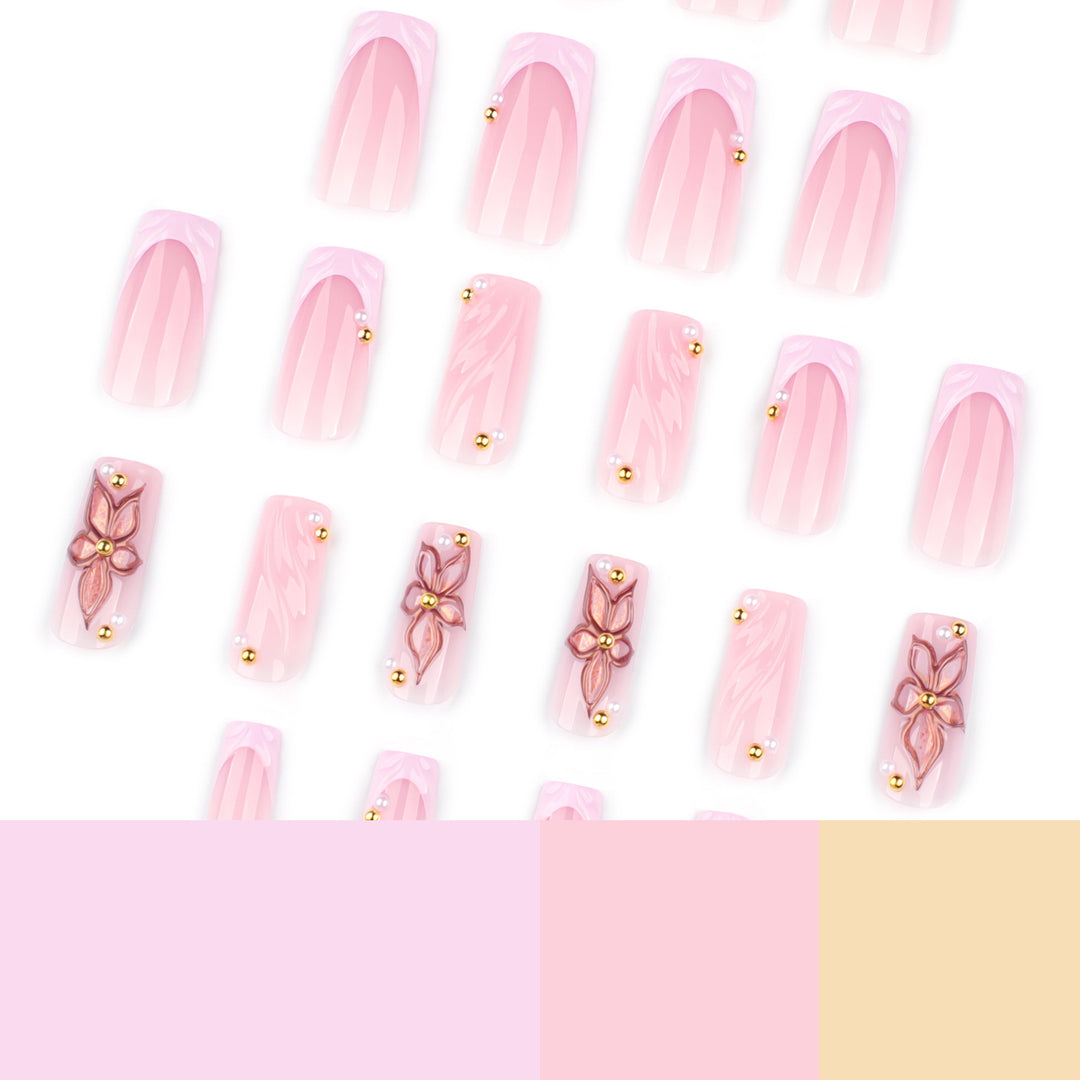 Artistic acrylic nails with flower design and glitter variations Bowlift