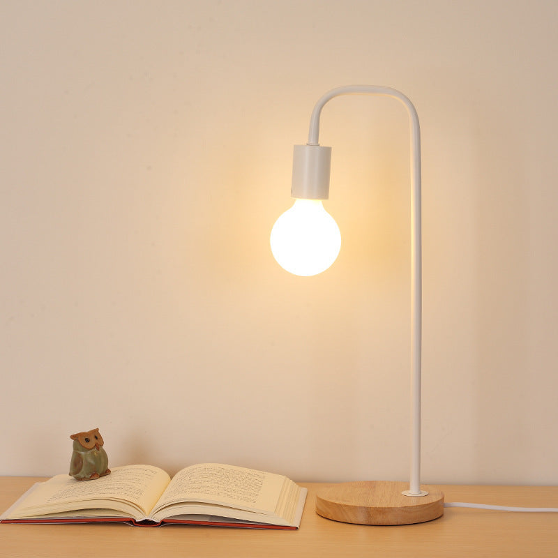 Minimalist Curved-Arm Table Lamp with Round Base and Standard Bulb Socket Bowlift