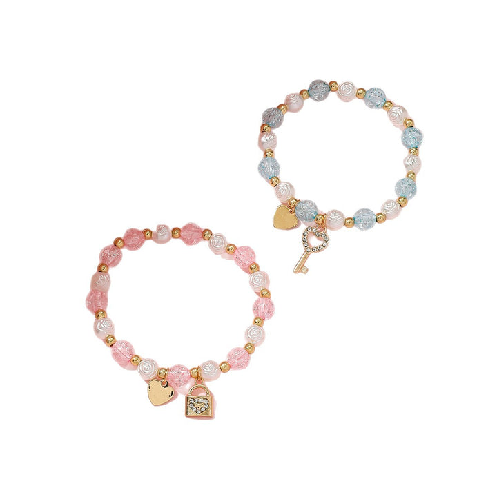 Playful bracelet set with heart and key design Bowlift