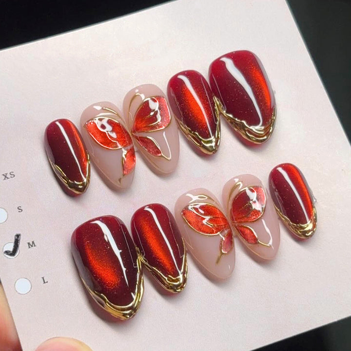 Artistic Press-On Nail Set with Floral and Metallic Accents Bowlift
