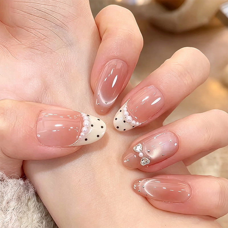 Artificial nail set with sparkling glitter accents Bowlift