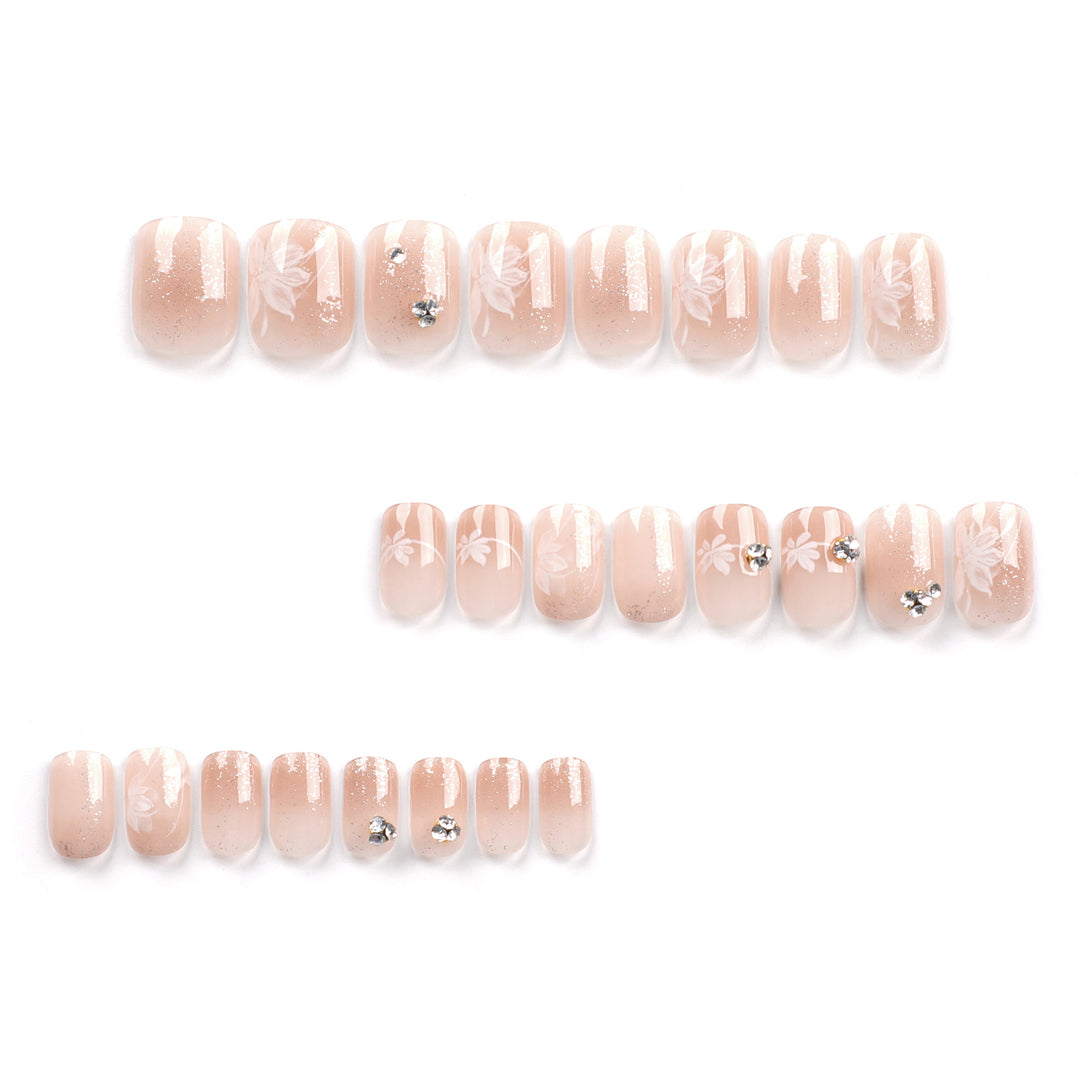 Elegant Nail Art with Holographic Accents and Floral Embellishments Bowlift