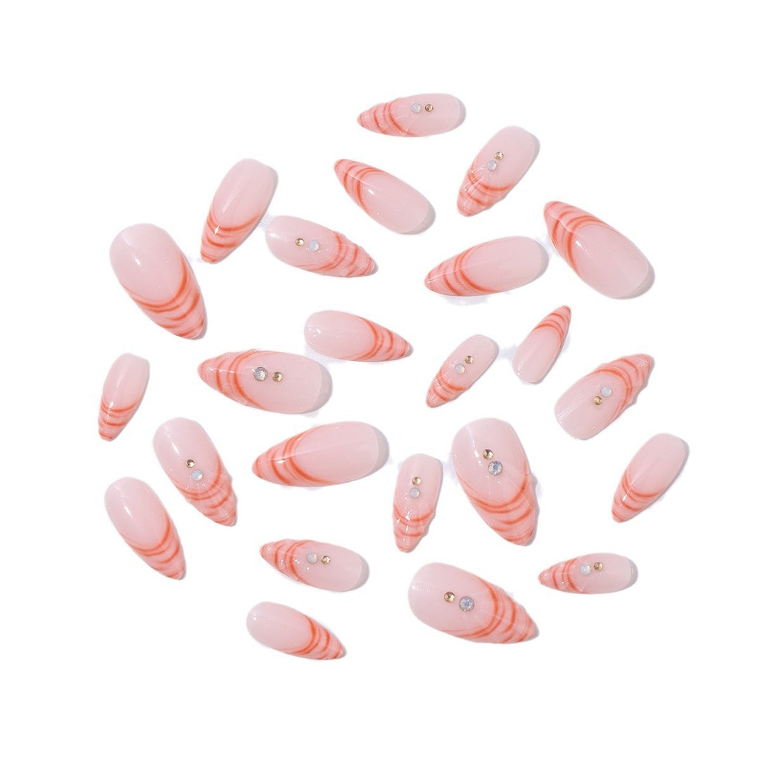 Acrylic nail set with curved tip style and glitter accents Bowlift