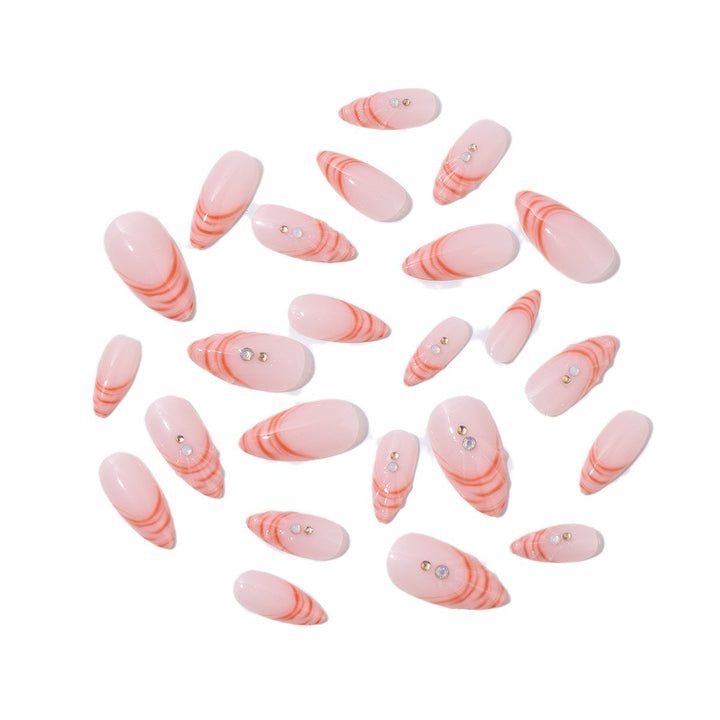 Acrylic nail set with curved tip style and glitter accents Bowlift