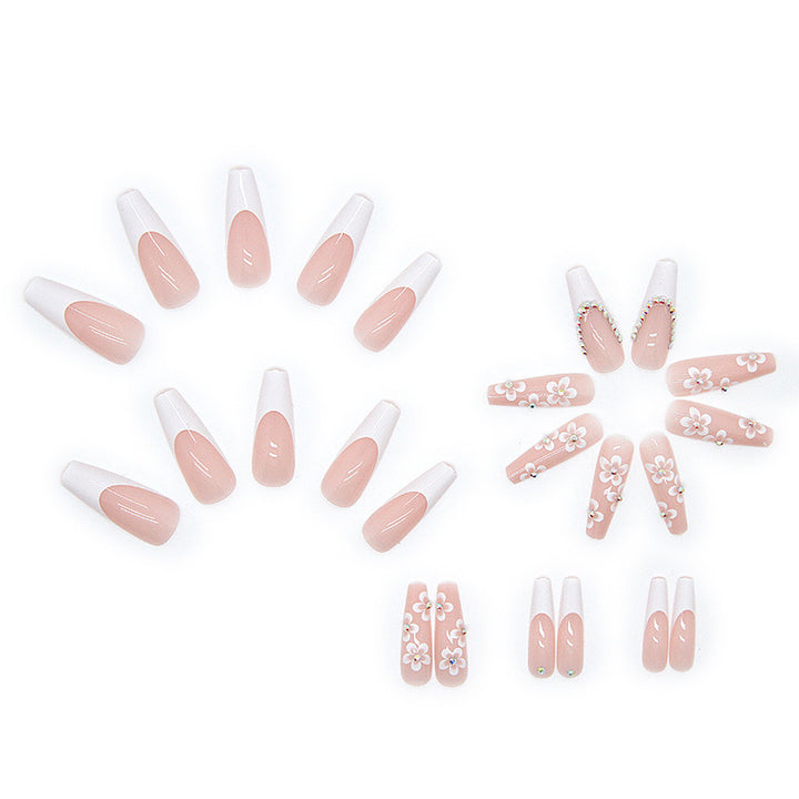 Artificial nail set with romantic floral decorations and glitter accents Bowlift