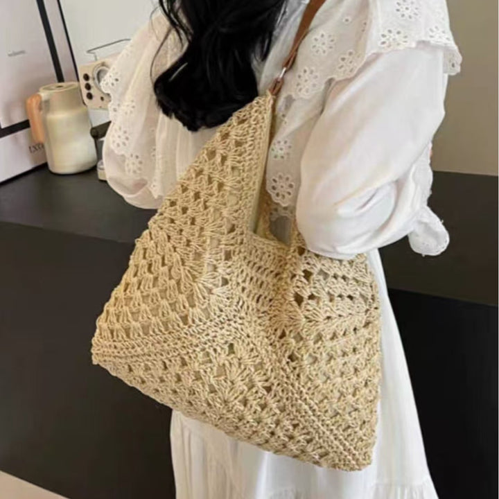 Handbag with Artistic Macrame Design and Flexible Carrying Comfort Bowlift