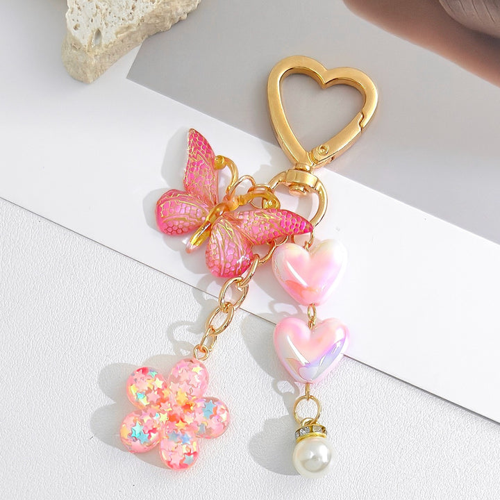 Playful keychain with hearts and flower motif Bowlift
