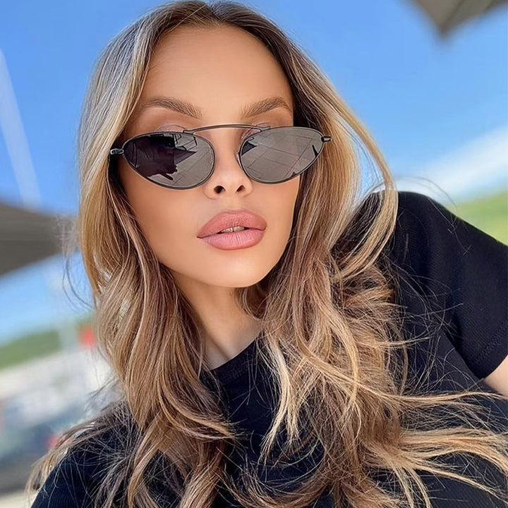 Ladies fashionable sunglasses in elegant oval design Bowlift