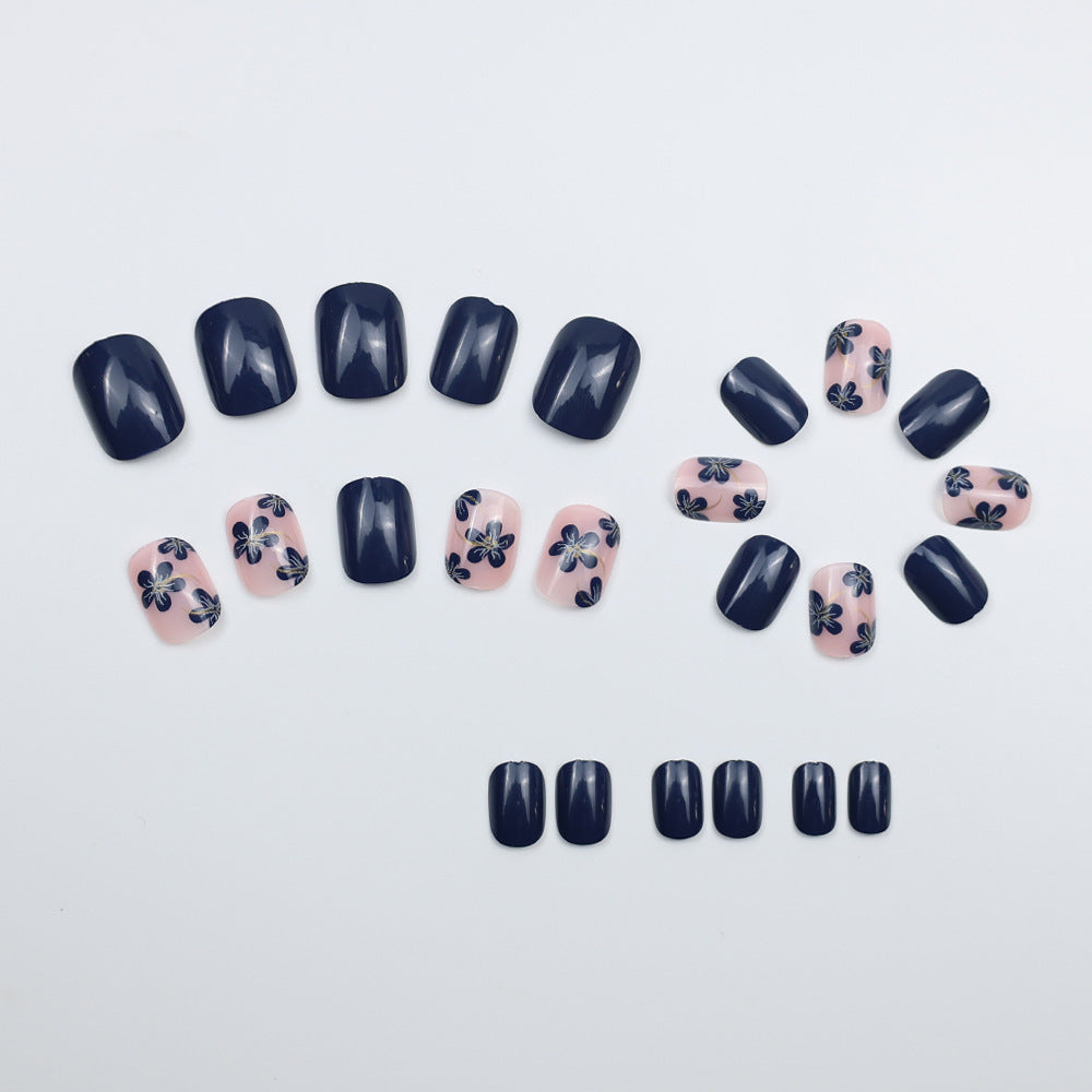Artificial nails with floral designs and glossy accents Bowlift