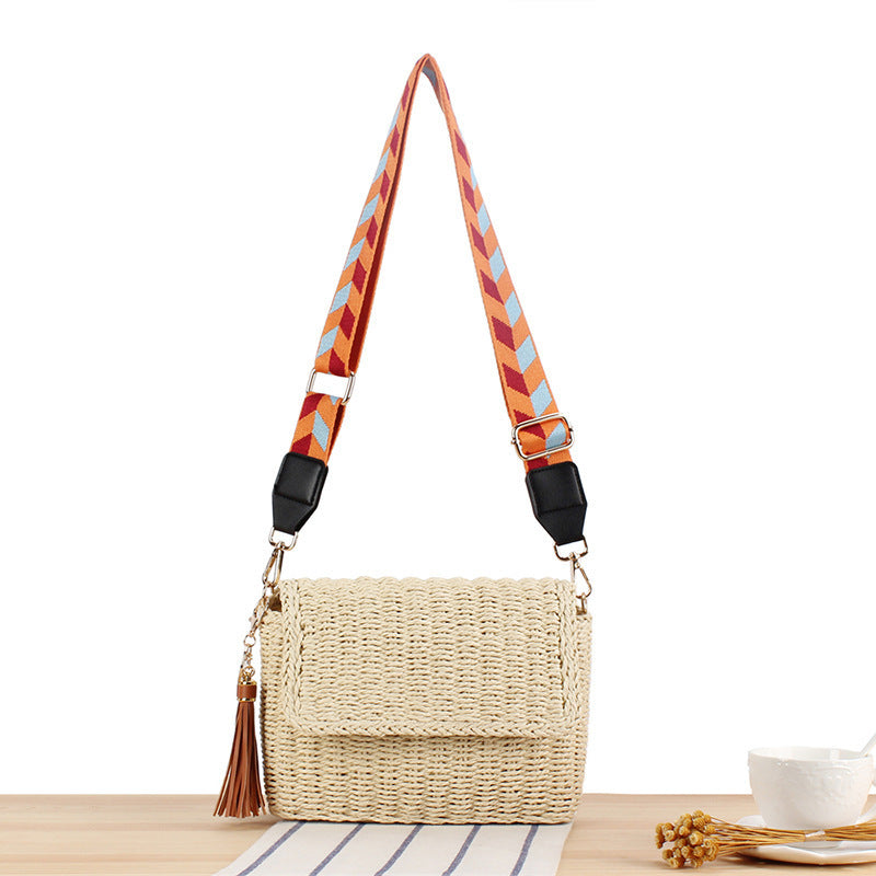 Woven Raffia Shoulder Bag with Decorative Shoulder Strap Bowlift