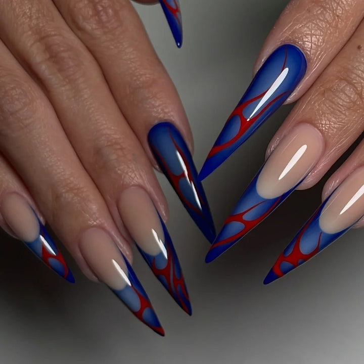 Artful stiletto nails with colorful designs and creative accents Bowlift