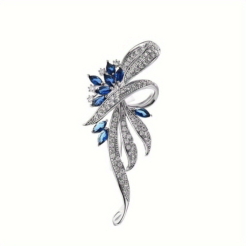 Exquisite brooch with sparkling zirconia and blue gemstones Bowlift