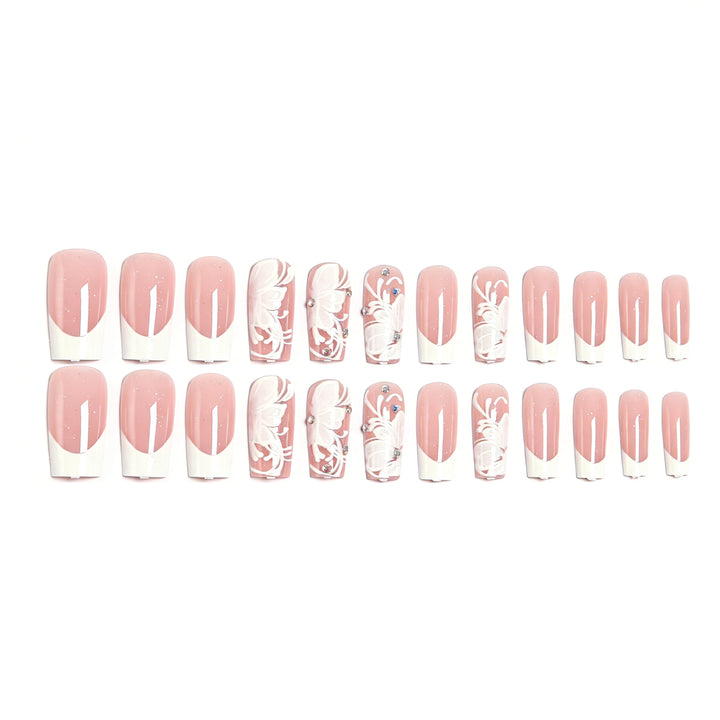 Artificial nails with floral embellishments and glitter details Bowlift