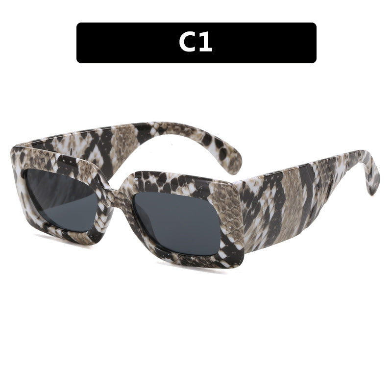 Women extravagant sunglasses with striking snake pattern Bowlift