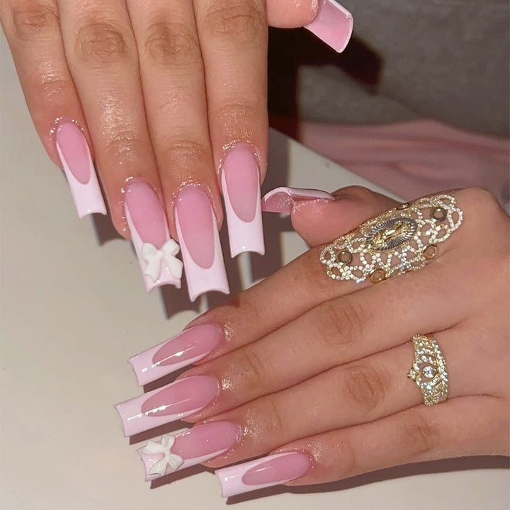 Artificial nail set with elegant tips and playful 3D design Bowlift