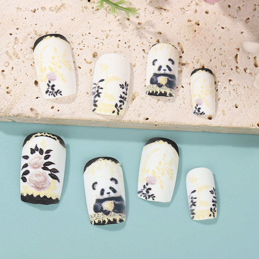 Artificial nails with floral panda design Bowlift