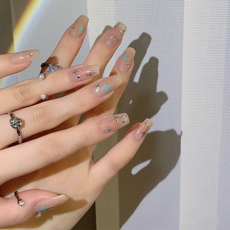 Acrylic nail set with sparkling star and glitter elements Bowlift