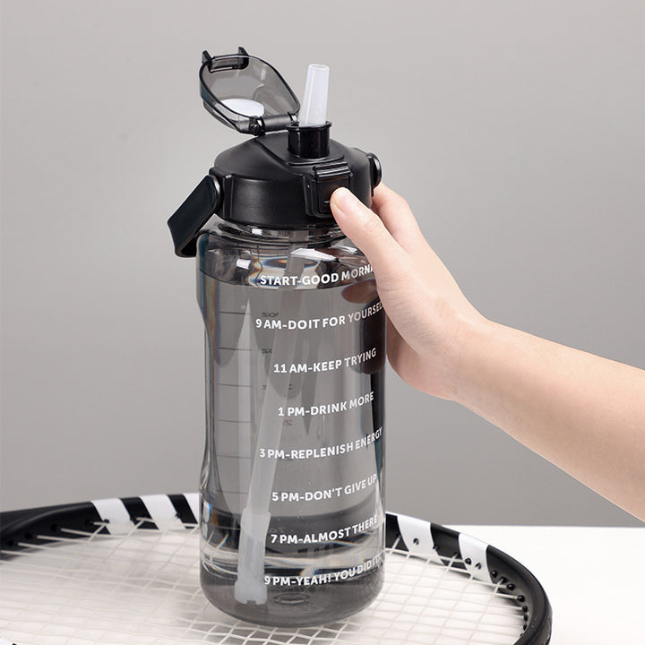 Women's motivation water bottle with integrated time markings and ergonomic design Bowlift