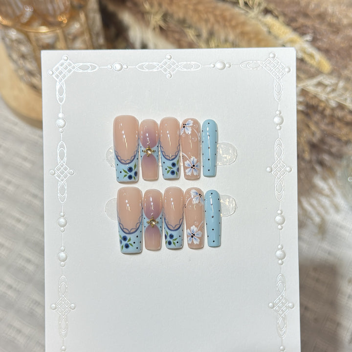 Artistic Press-On Nail Set with Floral and Geometric Design Bowlift