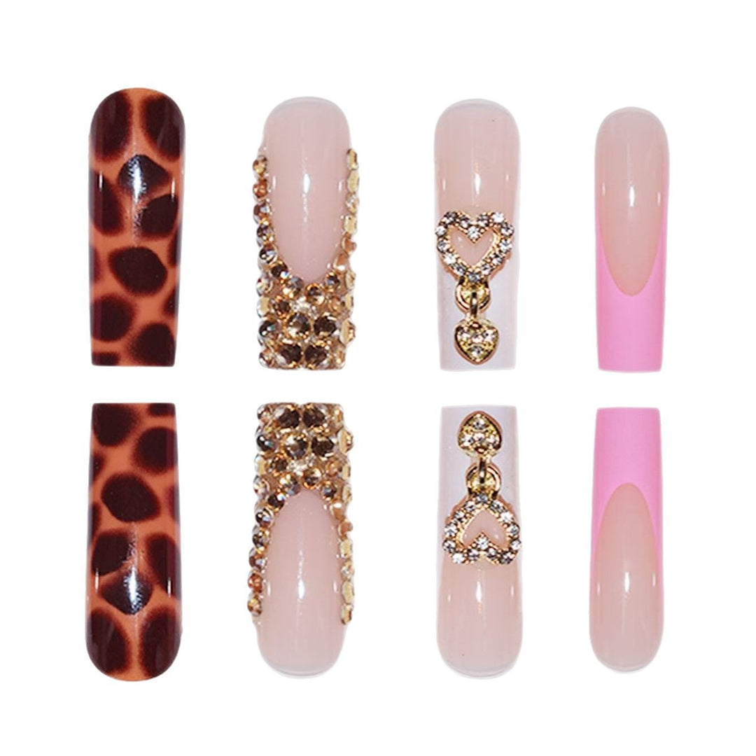 Glamorous Decorative Long Press-On Nails with Metallic Accents Bowlift