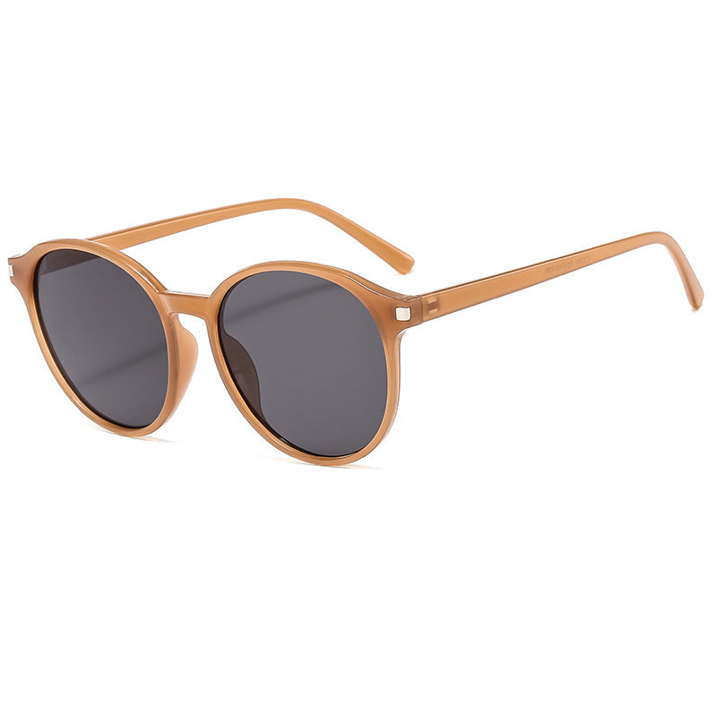 Women's retro-inspired sunglasses with curved frames and UV protection Bowlift