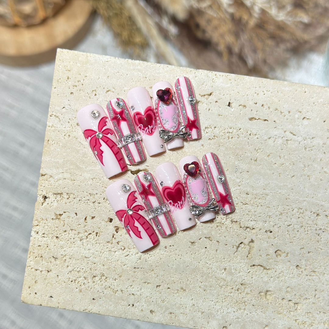 Artistic Press-On Nail Set with Playful Heart and Palm Designs Bowlift