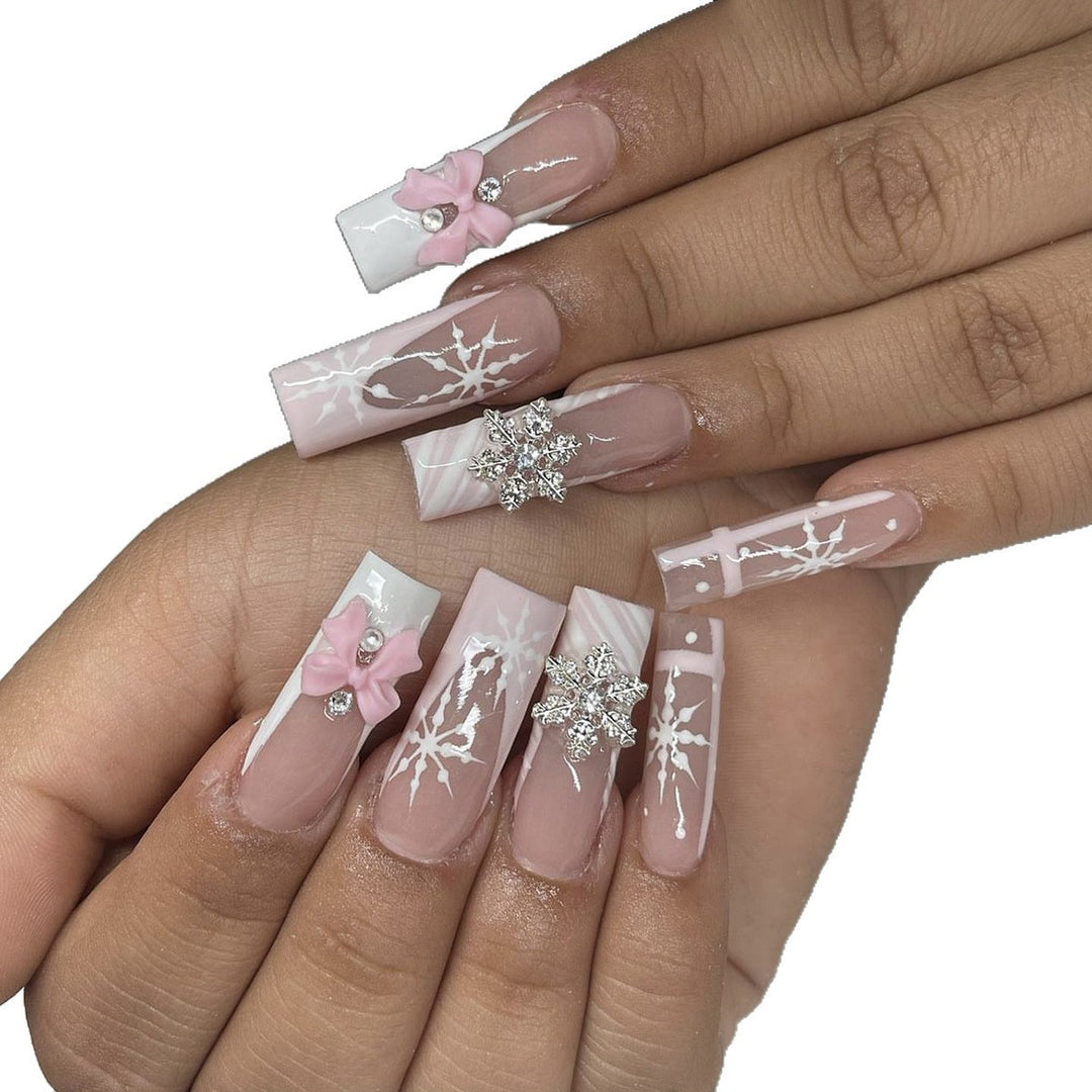 Creative nail art set with filigree snowflake and bow decorations Bowlift