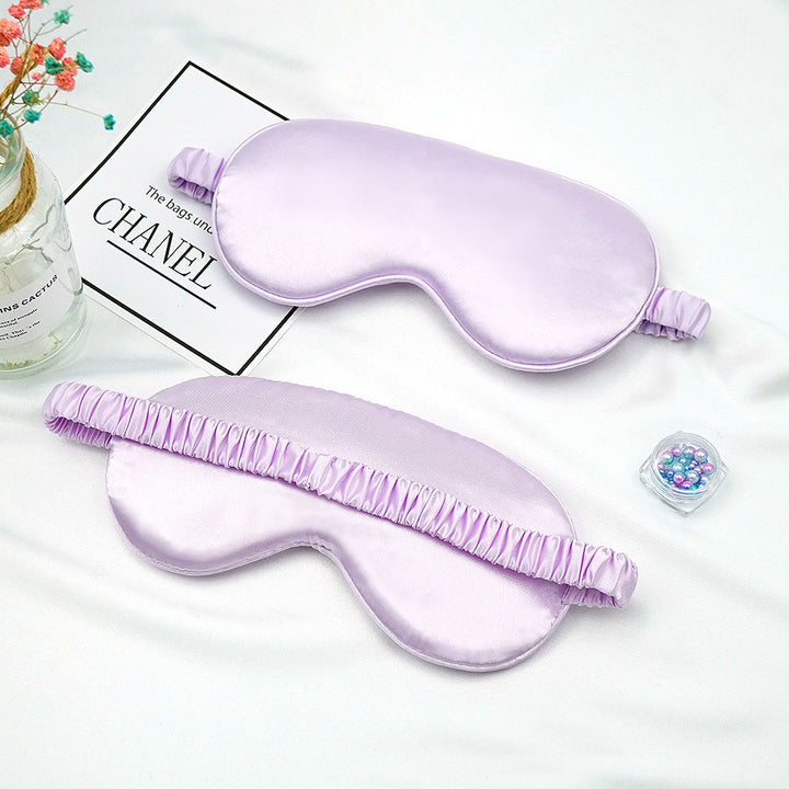 Women's breathable satin eye mask with ergonomic curvature, soft padding and gathered anti-slip band Bowlift