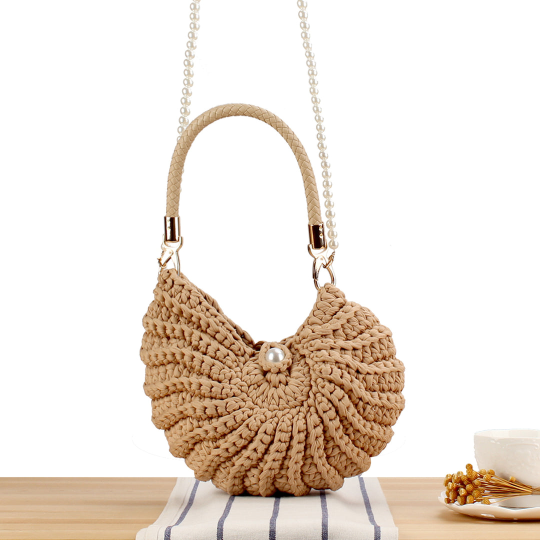 Evening bag with pearl decorated handle Bowlift
