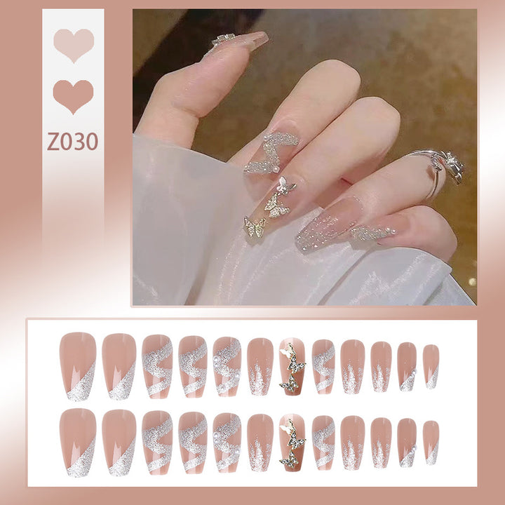 Artificial nail set with sparkling butterflies and glittering decorations Bowlift