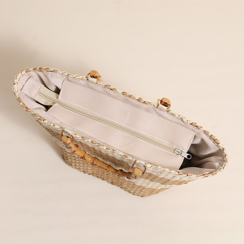 Braided bast bag with bamboo handle and decorative lining Bowlift