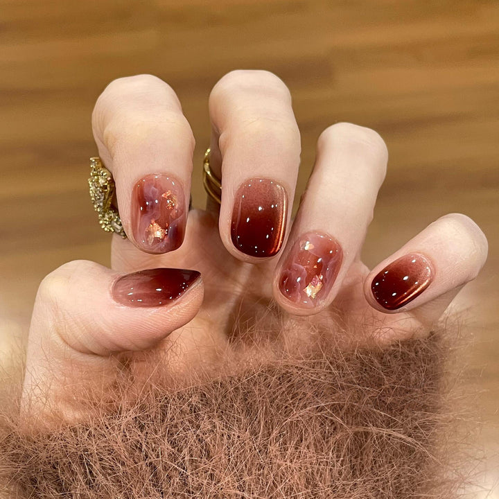 Artificial nails in modern ombre design Bowlift