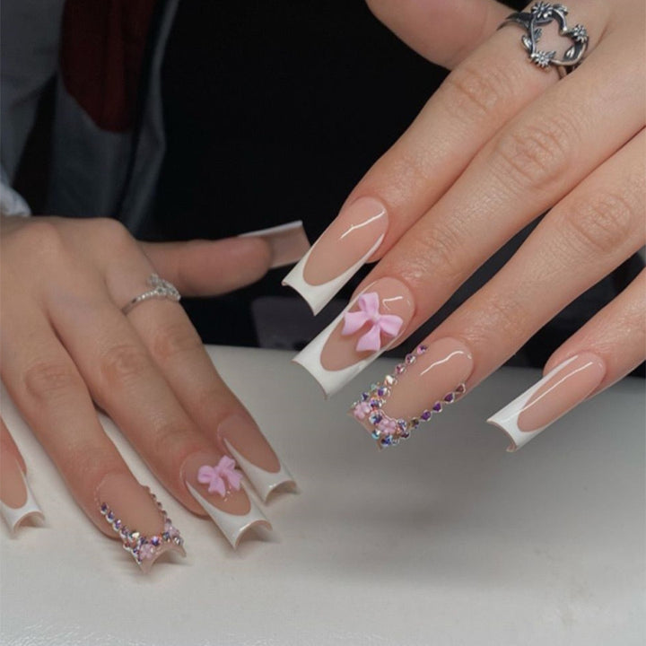 Artifical nail set with glamorous 3D bows and crystal embellishments Bowlift