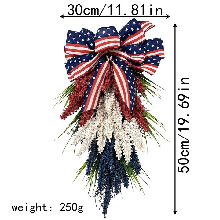 Unisex hanging floral swag with large bow and artificial berry branches Bowlift