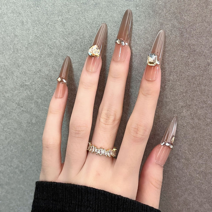 Artistic Stiletto Press-On Nail Art with Glimmering Accents Bowlift