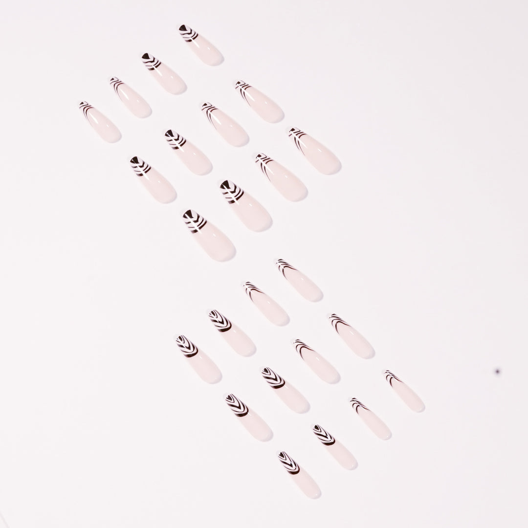 Artful Nail Extensions with Elegant Black-White Pattern Bowlift