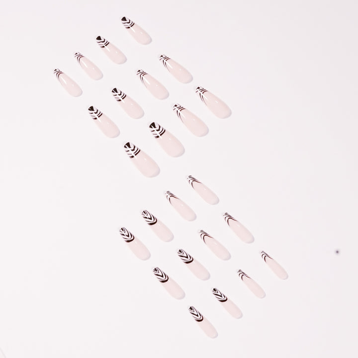 Artful Nail Extensions with Elegant Black-White Pattern Bowlift
