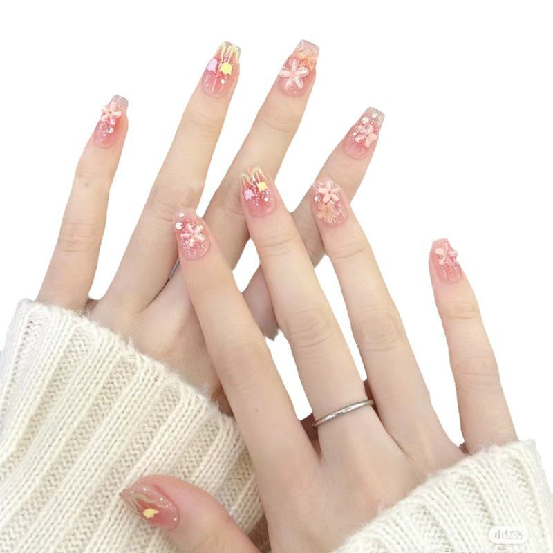 Artificial nails with floral design and glitter effects Bowlift