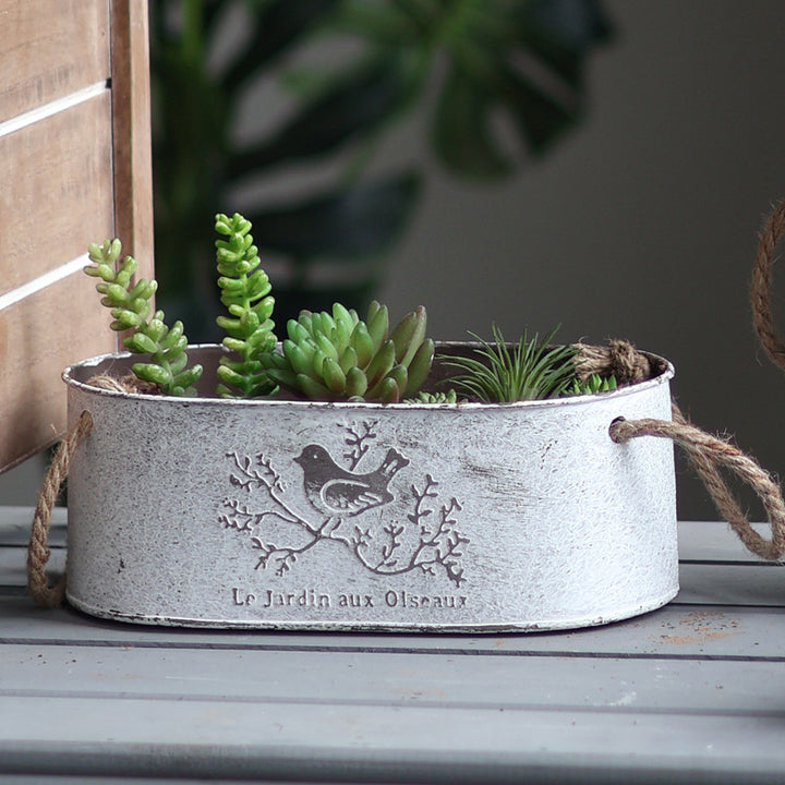 Decorative storage basket made of metal with natural design Bowlift