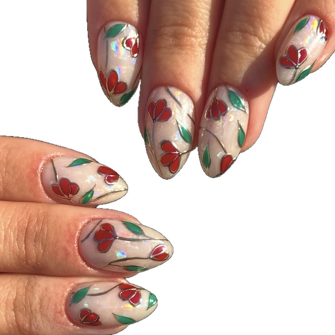 Nail art set with floral accents and glitter Bowlift