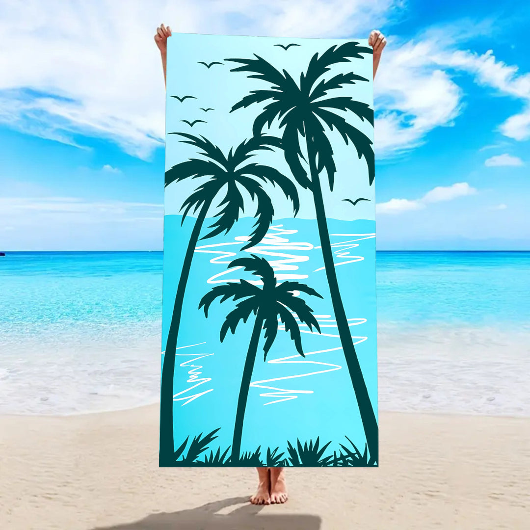 Beach towel with tropical palm leaf pattern Bowlift
